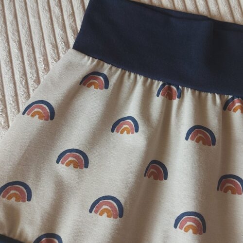arc en ciel fond beige